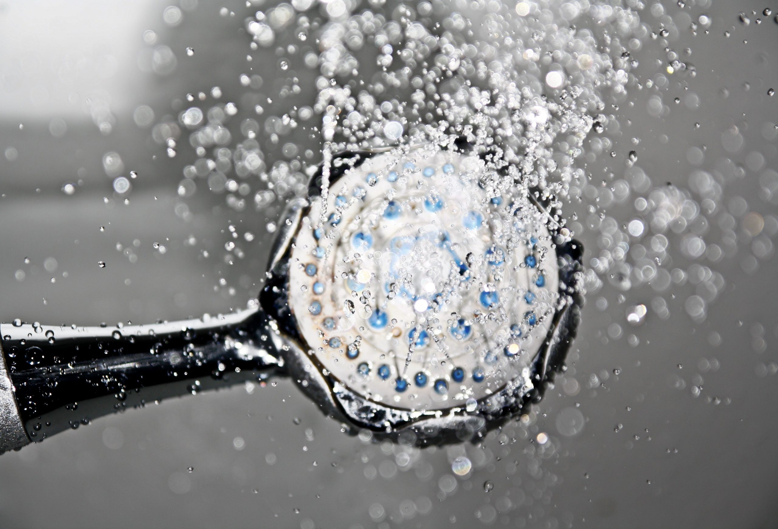shower-wand-spraying-water